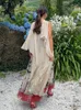 Womens tryck ruffles spliced ​​maxi klänning sexig från axel rygglös ärmlös vestidos 2024 casual lös semester strandrock 240319