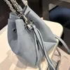 NOUVELLE Mode classique de luxe marque française Designer de luxe pour femmes Sac seau évidé Sac à main pour femme Sac à bandoulière Sac à main à bandoulière Portefeuille 23 cm * 19 cm