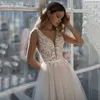Urban sexy jurken UZN A-lijn kant en tule bruidsjurken diepe lieverd backless glitterrok trouwjurk met kralenriem vestido de noche yq240329