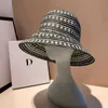 Wide Brim Hats Bucket Hats 2023 New Raffia Bucket Womens Folding Sun UV Hat Designer Luxury Hooked Beach Hat Handmade Fashion Straw HatL2403