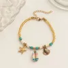 Braccialetti con ciondoli Bracciale con conchiglia con stelle marine conchiglia di Boemia per donna Corda fatta a mano con perline di riso Gioielli con bracciale Accessori da polso da spiaggia estiva