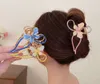 ヘアクリップバレット新しい女性メタルヘアクローカニヴィンテージバタフライシェイプヘアクリップヘッドバンドヘアピンクロスヘアリップファッションヘアアクセサリーギフト