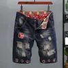 Short en jean à ourlet à carreaux Short en denim rétro avec trous déchirés Patch Design pour hommes Short de rue à jambe droite à taille moyenne W1Aq #