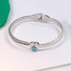 Bracelet coeur marque designer cristal bracelet couple bracelet manchette bracelet pour femmes plaqué or 18 carats S925 argent sterling bijoux de mode de mariage de haute qualité