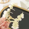 Coix de cheveux Haimeikang Rignestone Tassel Hair Claw Golden Bow Flower Clip Hair Hairpin Fomen Elegan Pony Ponytail Fashion Hair Accessoires Y240327