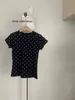 Polka dot kortärmad t-shirt, sommar ny unik rund nacke tröja, bantning och mångsidig temperament topp