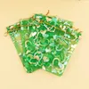 Sacs de rangement 100 pcs/lot Transparent Organza estampage coeur de pêche perle fil cordon bijoux emballage cadeau