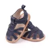サンダル新しいブランドの幼い男の子サンダル幼児夏靴1年間の革のラバーの靴底靴の新生児ベベの靴