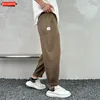 Pantaloni da uomo LEVIORTIN stile coreano dritto in cotone e lino 2024 pantaloni estivi versatili e comodi con coulisse in tinta unita