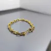 Bracciale a ferro di cavallo intrecciato a forma di U del marchio originale Mi Jin TFF con squisita fattura versione di fascia alta galvanica sottovuoto leggera di lusso in oro