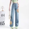 Jeans da donna 2024 Primavera di arrivo Stile coreano Donna Ricamo Cotone Denim Pantaloni alla caviglia Bottone in vita dritto V872