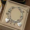 De nieuwe Double-Layer Love Pendant-armband is geschikt voor metalen armbanden voor vrouwen en veelzijdige dagelijkse accessoires AB43