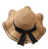 Mode halm breda randen hattar luxe solmonterad hatt europeisk och amerikansk guld flätad kvinnlig lös solskyddsmedel solskade platt mössa