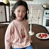 Den nya koreanska versionen av barn- och flickors långärmade tecknad tryckta modebesättningar T-shirt