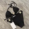 Luksusowe zupełnie nowe seksowne puste wyczerpane metalowe bikini solidne bandaż bikini zestawy mody strojów kąpielowych kobiety na plaży letnia stroje kąpielowe wakacyjne garnitury kąpielowe