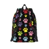 Sacs Sac à dos en toile à motif de pattes colorées pour femmes, hommes, étudiants, cartable pour ordinateur portable de 15 pouces, imprimés de pattes de chien, sacs pour animaux de compagnie