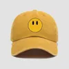 Drew Hat Designer Hat Smiley Face Pattern Casquette de baseball Couples d'été Vacances Voyage Visière Chapeau Multi-Style Multicolore Dessin Motifs Styles variés