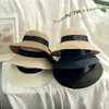 Cappelli a tesa larga Secchio Cappello da spiaggia estivo genitore-figlio casual marca Panama a tesa piatta con fiocco in paglia Ragazze sole H240330