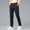 Sommerstrecker Casual Hosen Männer dünne weiche Modegeschäft elastische koreanische schlanke männliche kleiderhose grau schwarz grün 240328