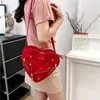 2023 Petit sac à bandoulière design en forme de coeur rivet veste forme sac à bandoulière unique sacs de créateurs de luxe 25Cb #