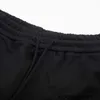 Designer Versão correta de shorts G soltos, casuais e confortáveis ​​com letras bordadas e calças elásticas OS 54 P457 para homens e mulheres