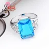 Cluster Rings Big Africa Blue Zircon Rectangle med dubbla söta blommor Kvinnsmycken 925 Sterling Silver Quality Girls Ring