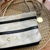 Luxur Designer Mini 22 Vita väskor kalvskinn äkta läder randhandväskor med myntpåse axelväska underarm utomhus trave shopping ficka 19 cm