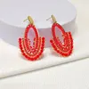 Orecchini pendenti con perline di cristallo Originalità lavorata a mano a maglia ellisse rossa in lega di Boemia grafico marea semplice perla di riso