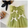 Flickaklänningar 2024 Summer Girls Princess Dress Solid Color Bow Decoration spetsnät i 2-8 år barn födelsedagspresent kläder