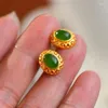 Ohrstecker aus altem Gold, eingelegt mit natürlicher grüner Hetian-Jade, oval, eleganter chinesischer klassischer Damen-Silberschmuck