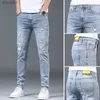 Mäns jeans vår/sommarkoreansk stil tårhål elastiska män smala fit arbete denim byxor med nödställd design blå casual jeans lyxiga män stylel2403