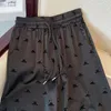 Pantaloni da donna firmati Pantaloni da lavaggio in raso di acetato floccato nero Pantaloni da donna Primavera e autunno Seta di ghiaccio Slim Allentati Casual Pantaloni larghi drappeggiati freschi leggings