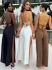 Kvinnors jumpsuits rompers boofnaa strappy backless split hem wide ben jumpsuit kvinnor elegant sexig fest nattklubb en bit outfit resort slitage c16-ch28 t240330