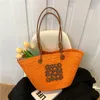 Bolso de mano de diseñador Moda de verano Rattan Mujeres Hombro Tejido Bolsos femeninos Gran capacidad Verano Playa Bolsas de paja Casual Totes Monederos