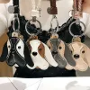 Tout nouveau chien de dessin animé mignon chiot à longues oreilles en cuir porte-clés en cuir gland porte-clés porte-clés femme voiture porte-clés livraison gratuite 2024