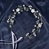 Hårklämmor Handgjorda hoopornament med färgbevarande glittrande strassblommesdesign för bröllopsmaskerader visar nov99