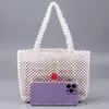 Fraise à la main Aklicho Nouvelle Atmosphère Femme Portable Teen Sac 2022 Nouvelles perles de couleur réelle tissées Grand sac à bandoulière 62Xv #