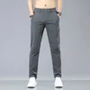 Sommerstrecker Casual Hosen Männer dünne weiche Modegeschäft elastische koreanische schlanke männliche kleiderhose grau schwarz grün 240328
