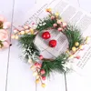 Dekorativa blommor bär krans simulerade girland hängande bröllopsdörr harts trä falska växt utomhus juldekorationer