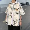 Camisas casuais masculinas 2024 Instagram Pi Shuai Tie Tingido Camisa para Meninos Design Único Verão Manga Curta Casaco Cityboy Grande Camisas Feminina