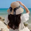 Cappelli a tesa larga Secchio Nastro pieghevole Bowknot Sole per ragazze Semplice cappello di paglia Protezione esterna Berretto da spiaggia Donna Genitore-bambino H240330