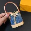 العلامة التجارية Mini Denim Bag Pendants الفاخرة سلسلة مفاتيح السيارات وحقائب Mini Clit Former