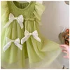 Flickaklänningar 2024 Summer Girls Princess Dress Solid Color Bow Decoration spetsnät i 2-8 år barn födelsedagspresent kläder