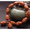 Strand Olive Stone Carving Lotus Leaf-versie Twaalf Zodiac Red Oil Core Handgesneden dierenarmband