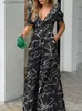 Kobiety Jumpsuits Rompers Summer Nowy damski nadruk moda w dekolcie szerokie nogi kombinezon Spodnie Casual Temperament Elegancki długie spodnie T240330