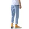 Jeans effetto consumato di colore chiaro da uomo, pantaloni corti slim fit da uomo, pantaloni autunnali da uomo, pantaloni mendicante versione coreana da studente estivo da uomo
