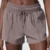 Taille elastische yogashorts met veters Los ademend hardlopen Fitness Vrije tijd sportshorts Zakken met trekkoord Strandtennis Bikershorts