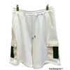 Diseñador La versión correcta de los pantalones cortos G unisex sueltos, casuales y cómodos con letras versátiles y capris OS elásticos NXSG