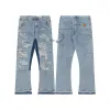 Amerykańskie projektant dżinsowe spodnie w trudnej sytuacji ręcznie malowane dżinsy męskie długie spodnie vintage patchwork swobodne rozkloszowane spodnie dżinsy uliczne rockowe
