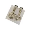 Boucles d'oreilles de créateurs pour femme Haut de gamme Fashion Light Luxury Boucles d'oreilles étoile à cinq branches Grand-mère Design unique Boucles d'oreilles rondes en relief Femme